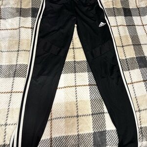 Adidas Black Track Pants with Iconic Stripes